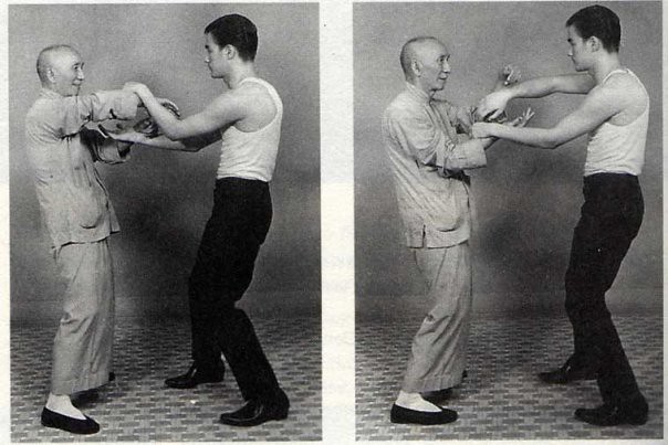 Grandmaster Ip Man and Bruce Lee during wing chun technique training